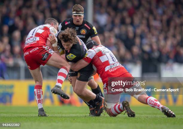 Exeter Chiefs' Alec Hepburn is tackled by Gloucester Rugby's Ruan Ackermann during the Aviva Premiership match between Exeter Chiefs and Gloucester...