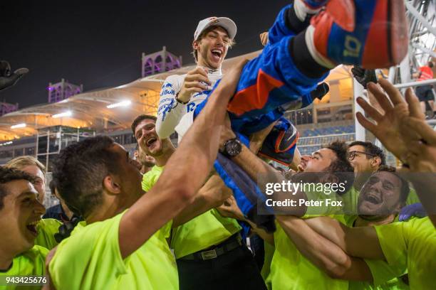 Scuderia Toro Rosso celebrate with Pierre Gasly of Scuderia Toro Rosso and France after finishing in 4th position during the Bahrain Formula One...