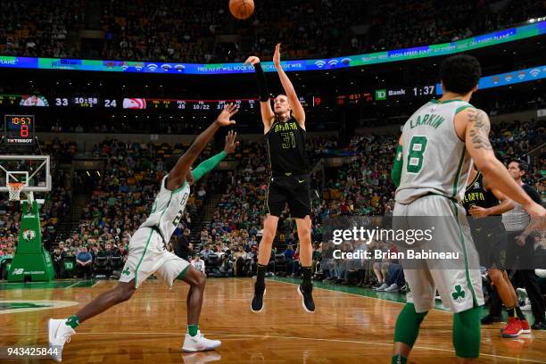 Mike Muscala of the Atlanta Hawks shoots the ball against the Boston Celtics on April 8, 2018 at the TD Garden in Boston, Massachusetts. NOTE TO...