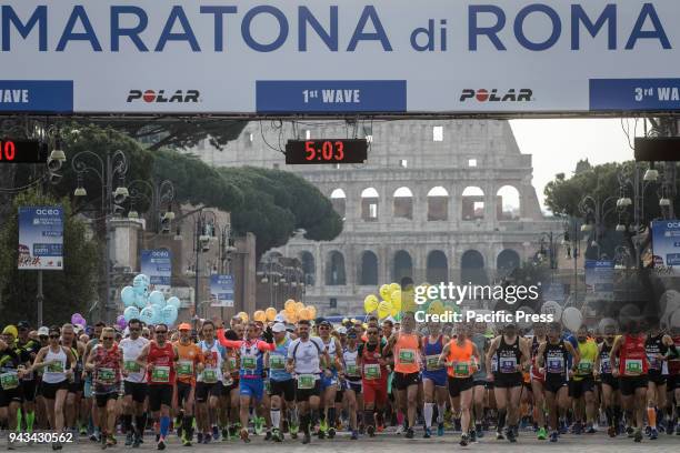 Runners compete during the 24th edition of the Maratona di Roma , an annual IAAF marathon competition hosted by the city of Rome, Italy on April 08,...