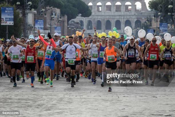 Runners compete during the 24th edition of the Maratona di Roma , an annual IAAF marathon competition hosted by the city of Rome, Italy on April 08,...