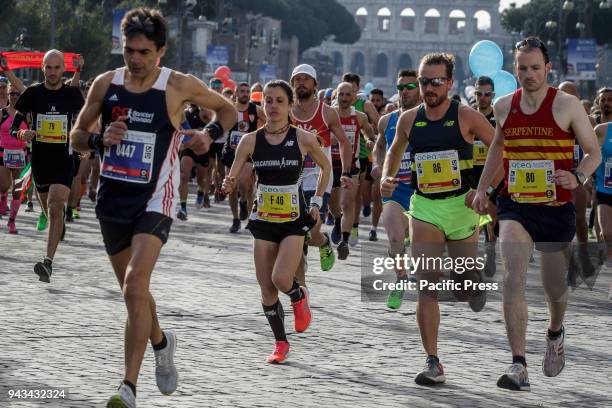 Runners compete during the 24th edition of the Maratona di Roma , an annual IAAF marathon competition hosted by the city of Rome, Italy on April 08,...