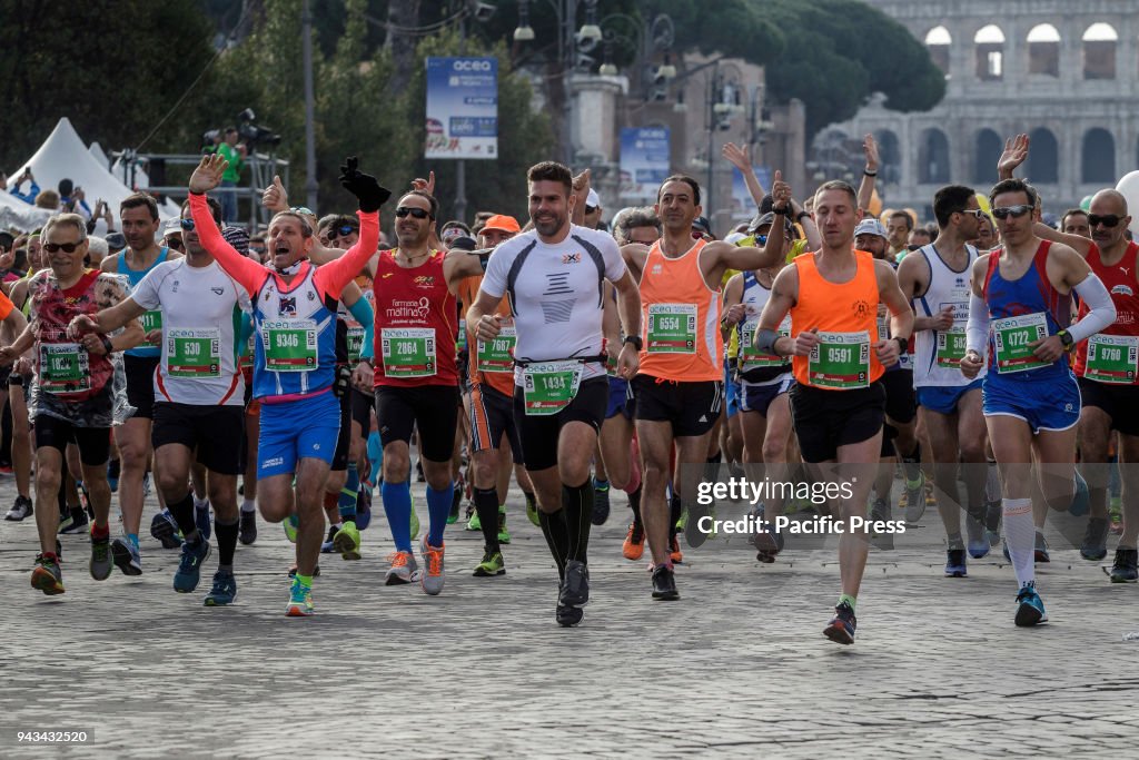 Runners compete during the 24th edition of the Maratona di...