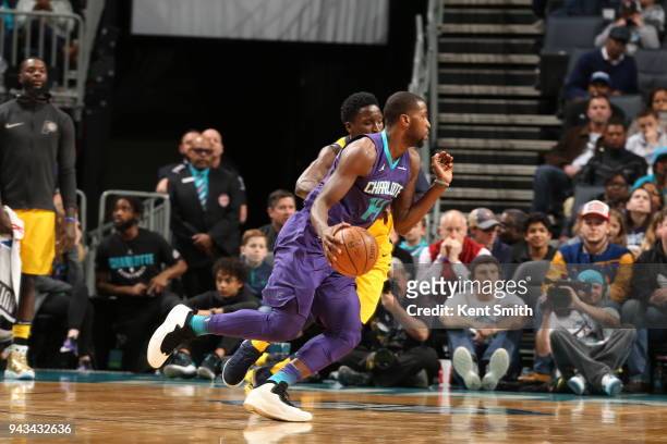 Michael Kidd-Gilchrist of the Charlotte Hornets handles the ball against the Indiana Pacers on April 8, 2018 at Spectrum Center in Charlotte, North...