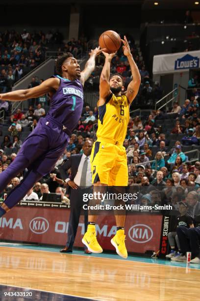 Cory Joseph of the Indiana Pacers shoots the ball against Malik Monk of the Charlotte Hornets on April 8, 2018 at Spectrum Center in Charlotte, North...