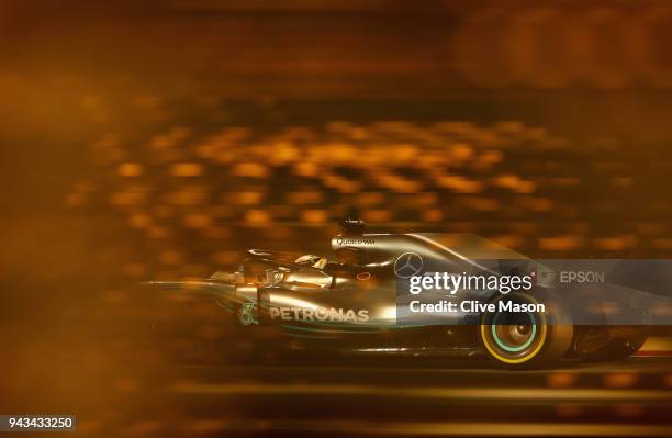 Lewis Hamilton of Great Britain driving the Mercedes AMG Petronas F1 Team Mercedes WO9 on track during the Bahrain Formula One Grand Prix at Bahrain...