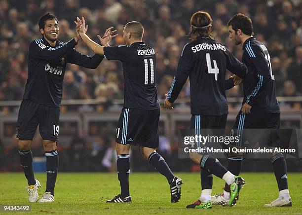 Ezequiel Garay of Real Madrid celebrates his goal with his teammate the during the La Liga Match between Valencia and Real Madrid at Estadio Mestalla...