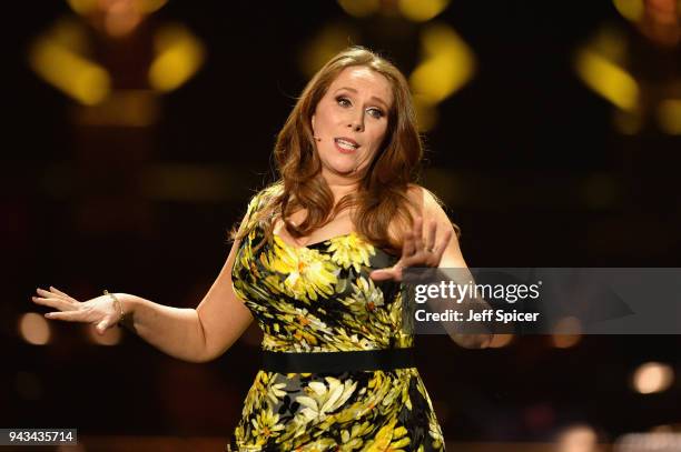 Host Catherine Tate speaks on stage during The Olivier Awards with Mastercard at Royal Albert Hall on April 8, 2018 in London, England.