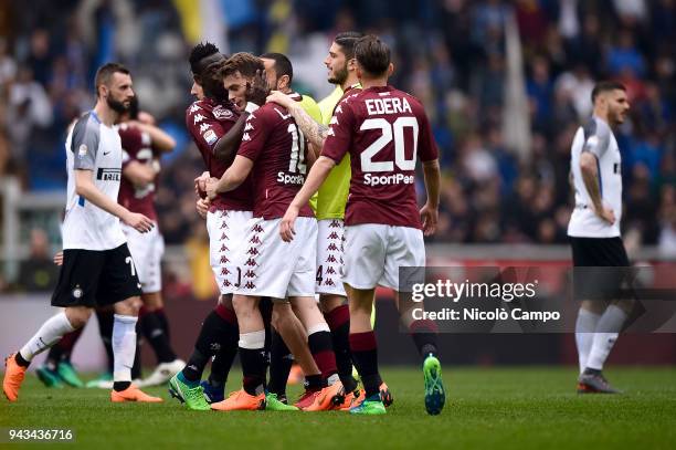 Adem Ljajic of Torino FC celebrates the victory with his teammates at the end of the Serie A football match between Torino FC and FC Internazionale....