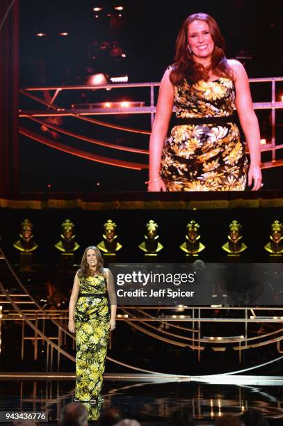 Host Catherine Tate speaks on stage during The Olivier Awards with Mastercard at Royal Albert Hall on April 8, 2018 in London, England.