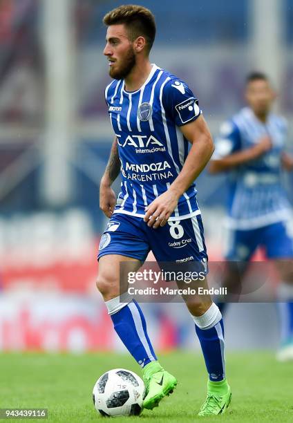 Angel Gonzalez of Godoy Cruz drives the ball during a match between San Lorenzo and Godoy Cruz as part of Argentine Superliga 2017/18 at Pedro...