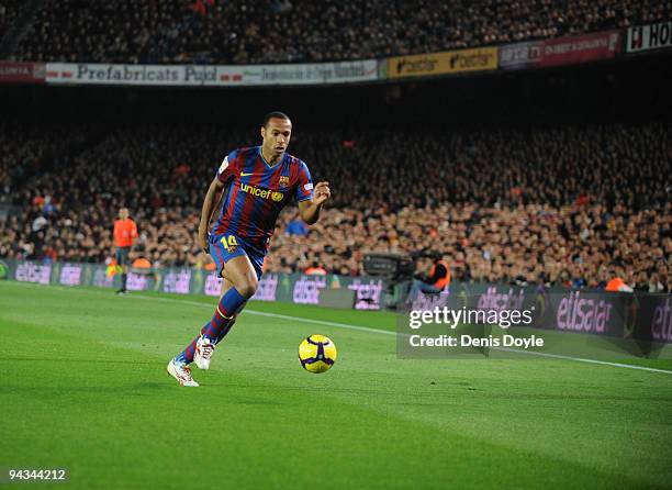 Thierry Henry of Barcelona in action during the La Liga match between Barcelona and Espanyol at the Camp Nou stadium Stadium on December 12, 2009 in...