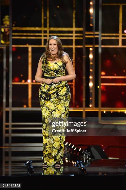 Host Catherine Tate speaks on stage during The Olivier Awards with Mastercard at Royal Albert Hall on April 8, 2018 in London, England.