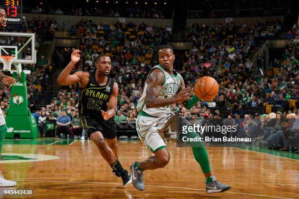 Terry Rozier of the Boston Celtics handles the ball against Isaiah Taylor of the Atlanta Hawkson April 8, 2018 at the TD Garden in Boston,...