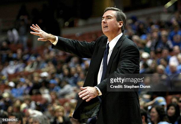 Head coach Rick Stansbury of the Mississippi State Bulldogs signals during the game with the UCLA Bruins in the John Wooden Classic on December 12,...