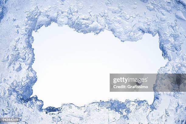 blue ice framing blank pale blue background - freezing cold stockfoto's en -beelden