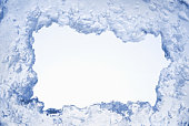 Blue ice framing blank pale blue background