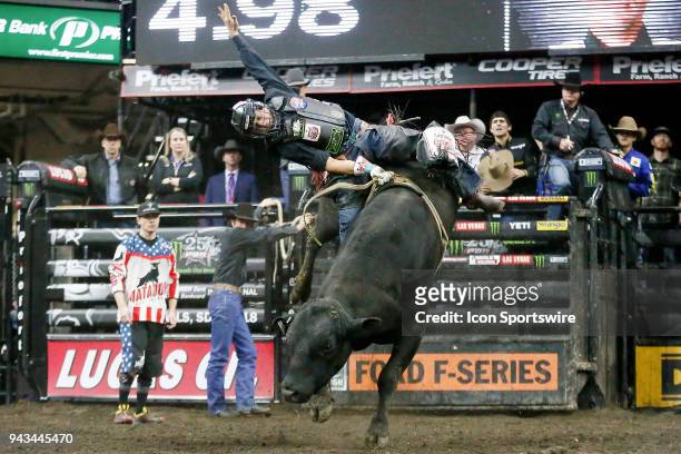 Claudio Montanha Jr. Rides bull Stunt Man Ray during round two of the 25th Professional Bull Riders Unleash The Beast, on April 7 at Denny Sanford...