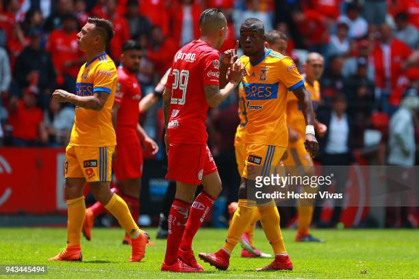 Enner Valencia of Tigres argues with Rodrigo Salinas of Toluca during the 14th round match between Toluca and Tigres UANL as part of the Torneo...