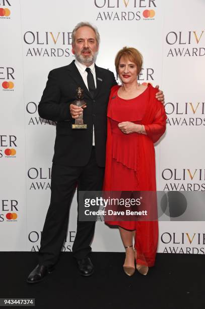 Sam Mendes , winner of the Best Director award for "The Ferryman", and Patti LuPone pose in the press room during The Olivier Awards with Mastercard...