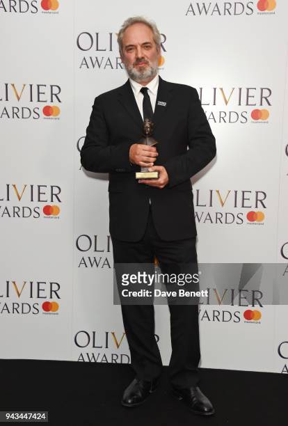 Sam Mendes, winner of the Best Director award for "The Ferryman", poses in the press room during The Olivier Awards with Mastercard at Royal Albert...
