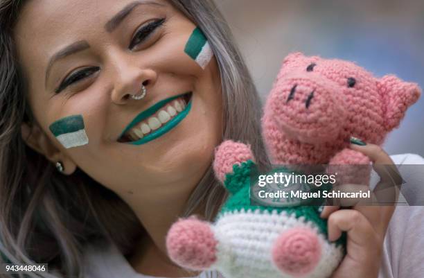 Fans cheer for the Palmeiras team during a match between Palmeiras and Corinthians in the final of Paulista Championship 2018 at Allianz Parque on...
