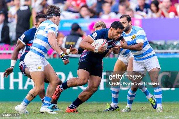 Martin Iosefo of USA fights for the ball during the HSBC Hong Kong Sevens 2018 match for Plate Final between Argentina and USA on April 7, 2018 in...
