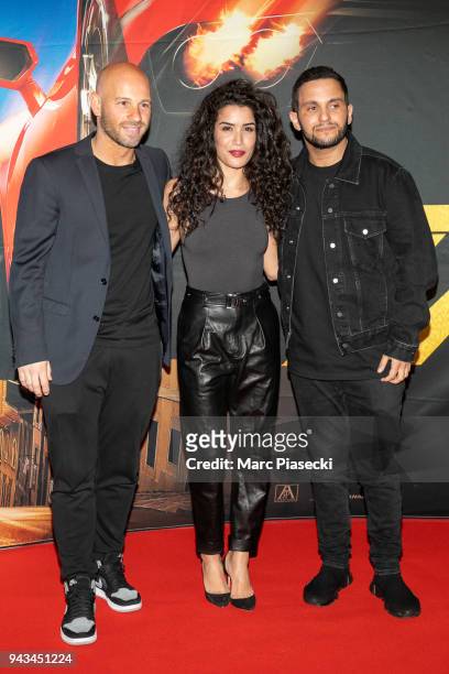 Actors Franck Gastambide, Sabrina Ouazani and Malik Bentalha attend the 'Taxi 5' Premiere at Le Grand Rex on April 8, 2018 in Paris, France.