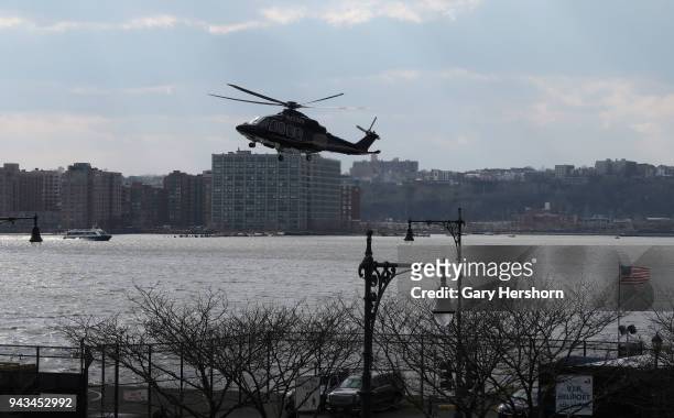 Helicopter lands at the VIP Heliport next to the Hudson River on the west side of Manhattan on April 6, 2018 in New York City.