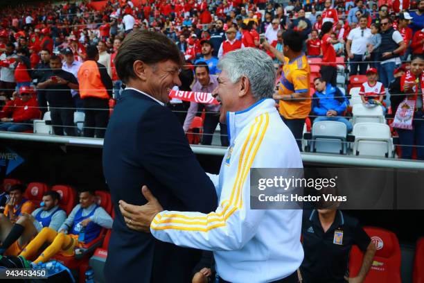 Hernan Cristante, Head Coach of Toluca and Ricardo Ferretti, Head Coach of Tigres greet during the 14th round match between Toluca and Tigres UANL as...