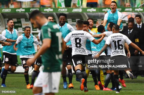 Corinthians players celebrate a goal scored by Rodriguinho against Palmeiras, during their 2018 Paulista championship final football match held at at...