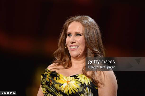 Host Catherine Tate speaks on stage during The Olivier Awards with Mastercard at Royal Albert Hall on April 8, 2018 in London, England.