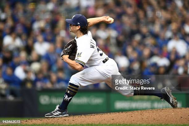 Taylor Williams of the Milwaukee Brewers throws a pitch during the seventh inning of a game against the Chicago Cubs at Miller Park on April 8, 2018...