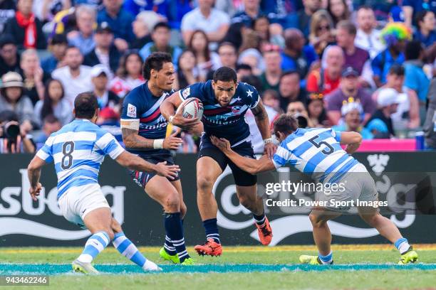 Martin Iosefo of USA fights with Rodrigo Etchart of Argentina during the HSBC Hong Kong Sevens 2018 match for Plate Final between Argentina and USA...