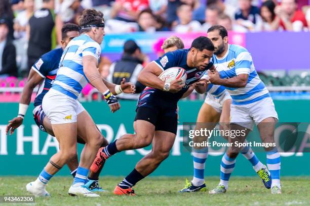 Martin Iosefo of USA fights for the ball during the HSBC Hong Kong Sevens 2018 match for Plate Final between Argentina and USA on April 8, 2018 in...