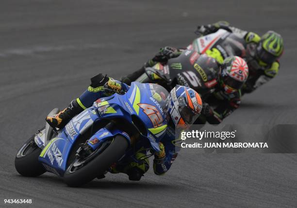 Spain's biker Alex Rins rides his Suzuki to finish in third place in the MotoGP race of the Argentina Grand Prix at Termas de Rio Hondo circuit, in...