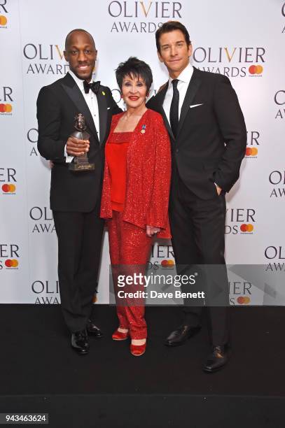Giles Terera, winner of the Best Actor in a Musical award for "Hamilton", Chita Rivera and Andy Karl pose in the press room during The Olivier Awards...