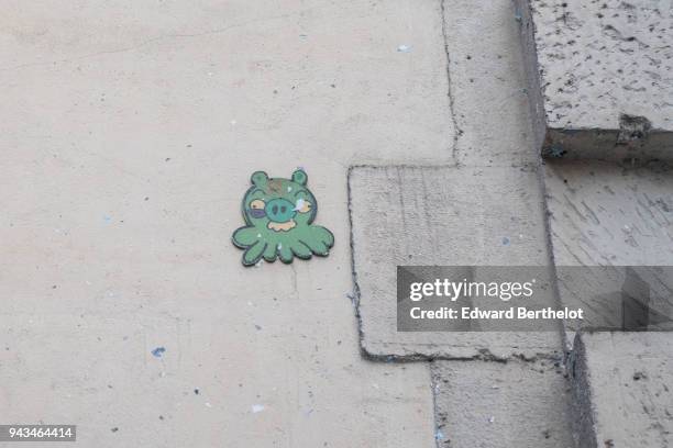 Street art by artist GZUP, representing a pig from the video game Angry Birds, in the 4th quarter of Paris, on April 7, 2018 in Paris, France.