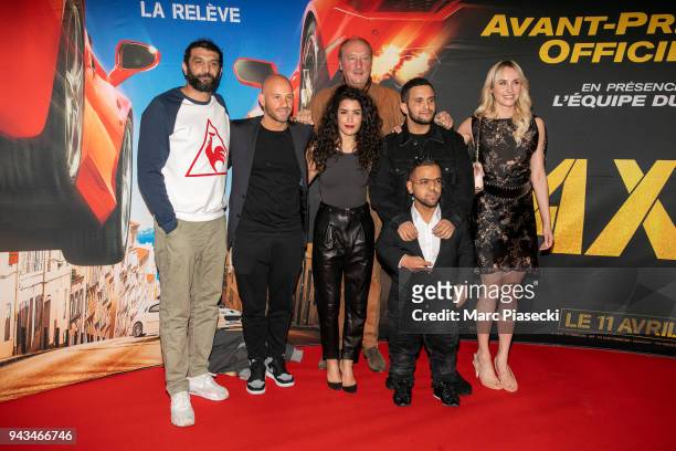 Actors Ramzy Bedia, Franck Gastambide, Sabrina Ouazani, Bernard Farcy, Malik Bentalha, Anouar Toubali and Sand Van Roy attend the 'Taxi 5' Premiere...