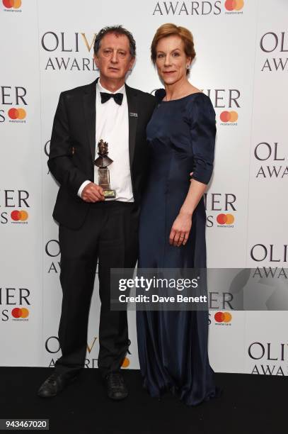 David Lan, winner of the Special Award, and Juliet Stevenson pose in the press room during The Olivier Awards with Mastercard at Royal Albert Hall on...