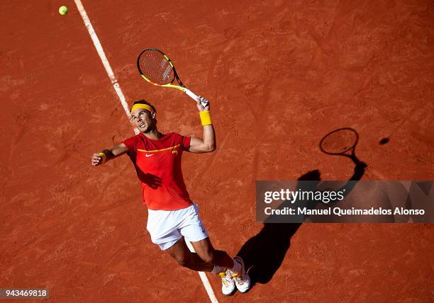 Rafael Nadal of Spain serves during his match against Alexander Zverev of Germany during day three of the Davis Cup World Group Quarter Final match...