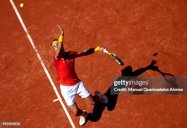 Rafael Nadal of Spain serves during his match against Alexander Zverev of Germany during day three of the Davis Cup World Group Quarter Final match...