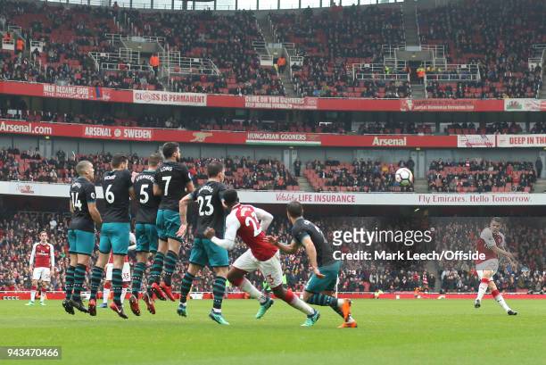 Granit Xhaka of Arsenal takes a free kick during the Premier League match between Arsenal and Southampton at Emirates Stadium on April 8, 2018 in...