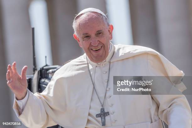 Pope Francis leaves St. Peter's Square at the Vatican after a Mass on the Sunday of Divine Mercy, Sunday, April 8, 2018.