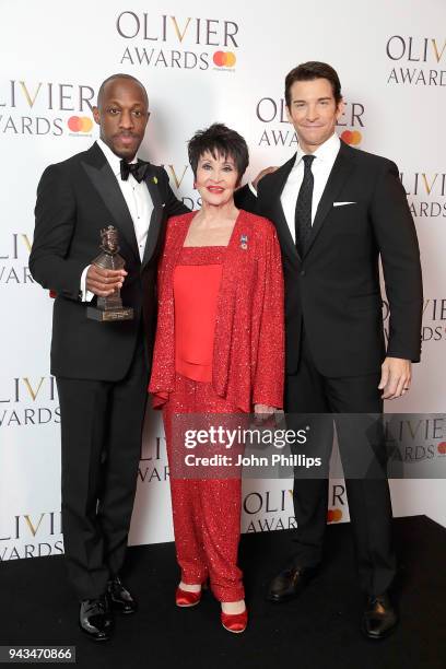 Giles Terera, winner of the Best Actor in a Musical award for 'Hamilton', poses with Chita Rivera and Andy Karl in the press room during The Olivier...