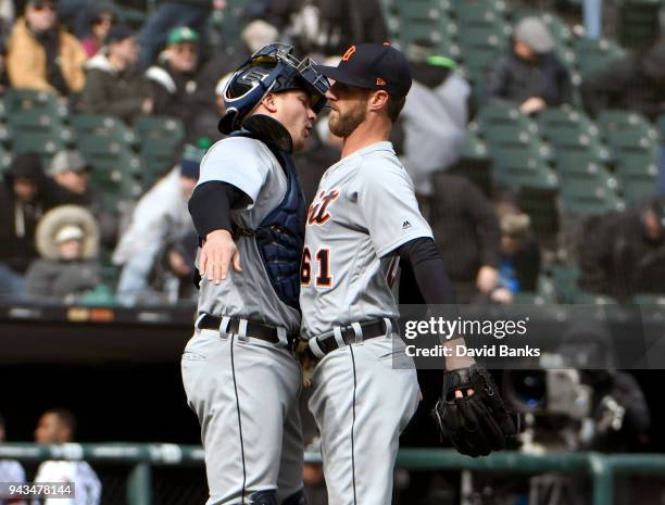 Shane Greene of the Detroit Tigers and John Hicks of the Detroit Tigers celebrate their win against the Chicago White Sox on April 8, 2018 at...