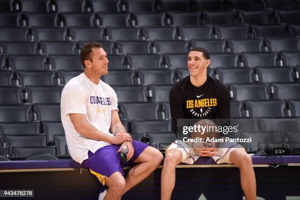 Head Coach Luke Walton of the Los Angeles Lakers and Lonzo Ball of the Los Angeles Lakers talk before the game against the Utah Jazz on April 8, 2018...