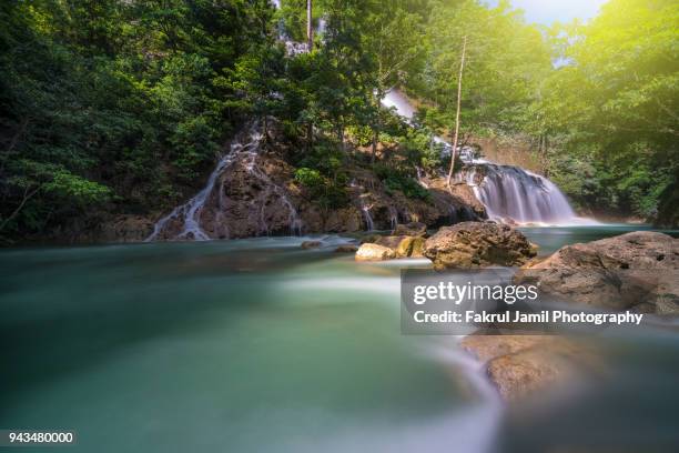 the beautiful lapopu waterfall. this waterfal is located in sumba island, indonesia. - sumba stock pictures, royalty-free photos & images