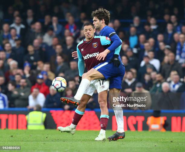 West Ham United's Javier Hernandez and Chelsea's Marcos Alonso during English Premier League match between Chelsea and West Ham United at Stamford...