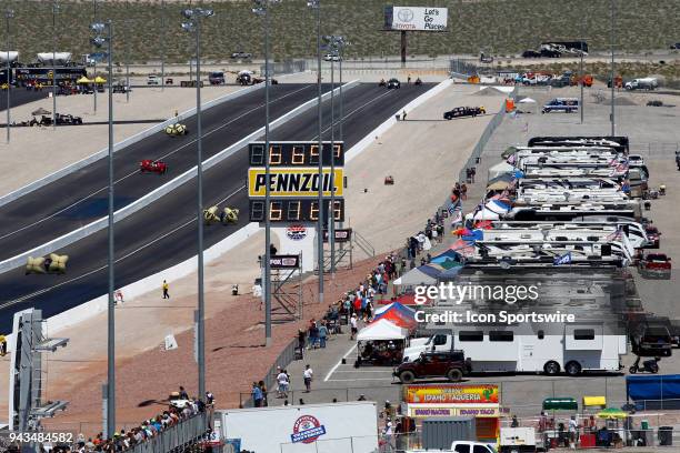 General view of the Trackside RV Lot with four funny cars deploying their parachutes during the 19th Annual DENSO Spark Plugs NHRA Four-Wide...